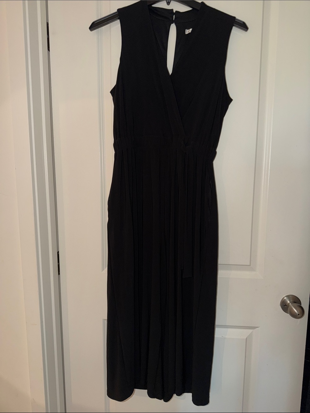 Jumpsuit with expandable waist and pockets